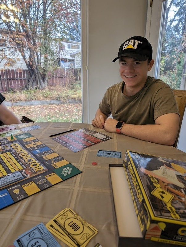 a man playing a round of contractor